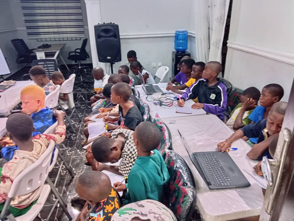 Participants working together around laptops at ZOERD
